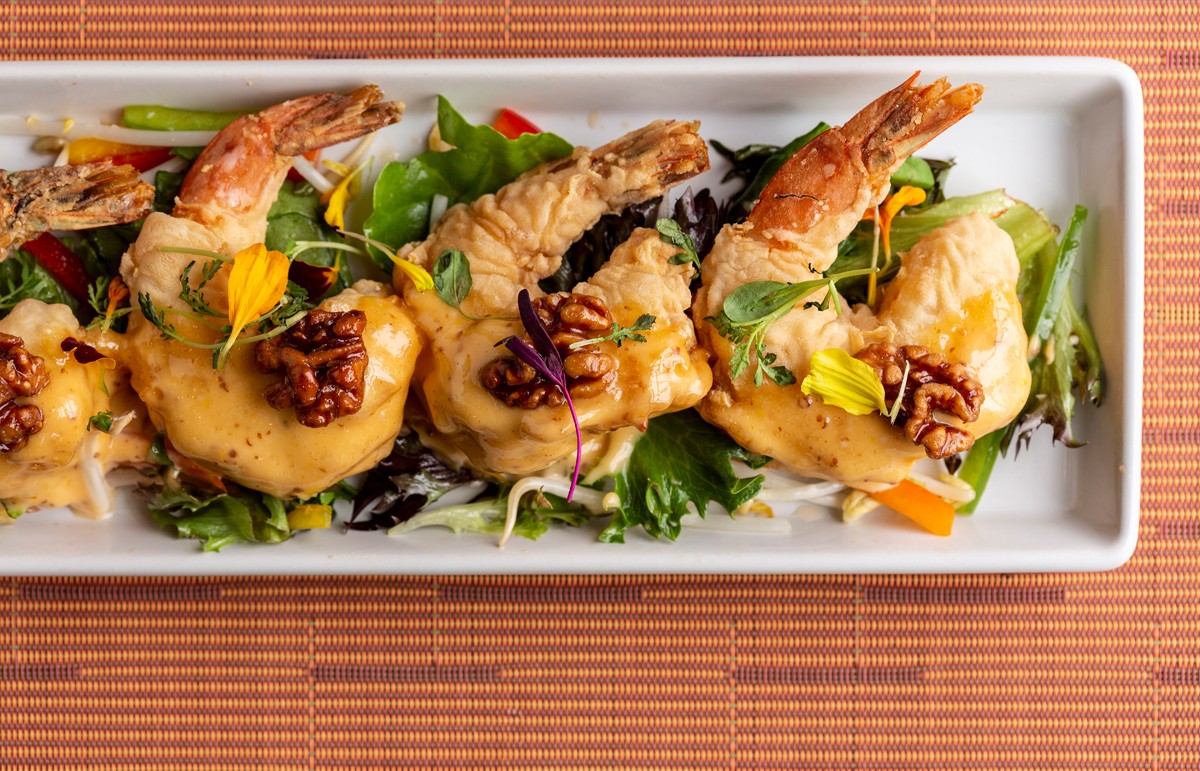 MC Modern Asian Cuisine signature dishes Peking Duck, Crispy Honey Walnut Shrimp, Black Pepper Beef, Assorted Specialty Sushi Rolls